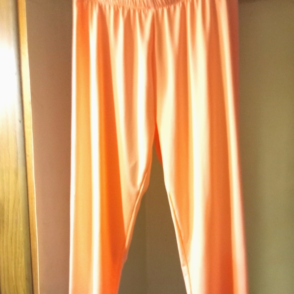Adorable size 14 coral color wash and wear cropped pants.Brand new! NEVER WORN!